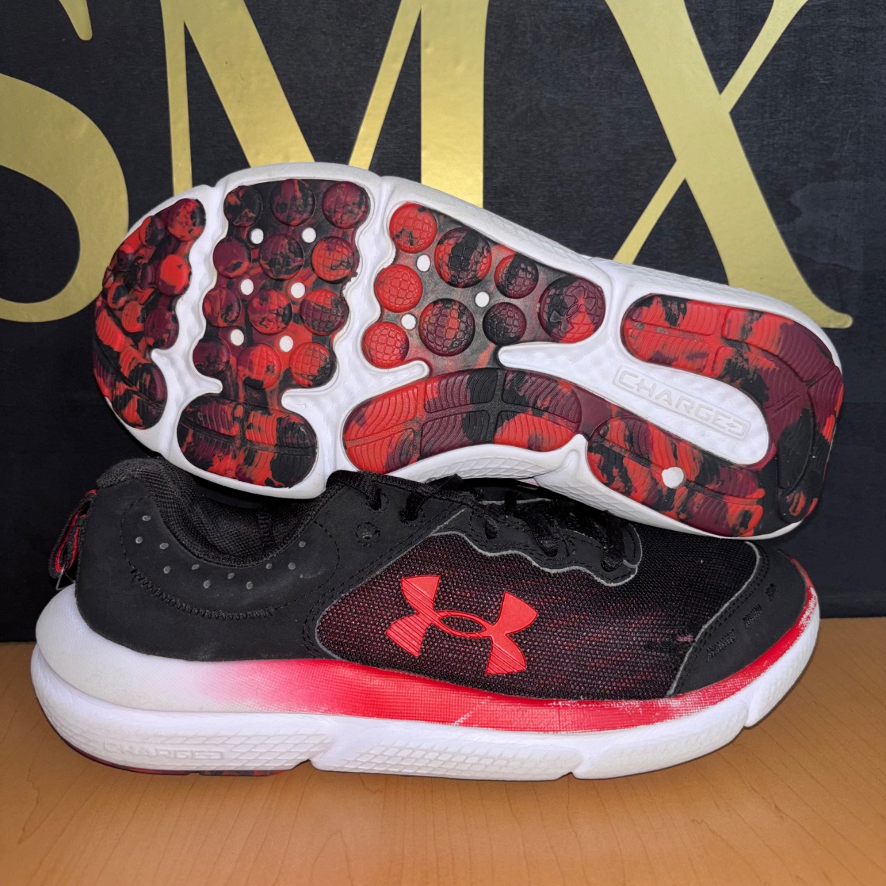Under Armour Charged Pursuit 2 negro con rojo y blanco · Foto 1